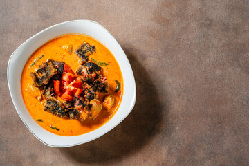 Fried eel with asam cikala or belut asam cikala cooked in spicy sour curry is a popular dish made from freshwater eel from sumatra