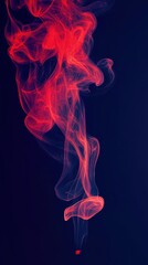 Obraz premium Red Smoke Swirling on Dark Background 