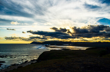 Obraz premium Beautiful sunset with orange sky color and very beautiful on Senggigi Beach, Lombok