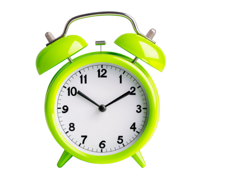 a green alarm clock with bells