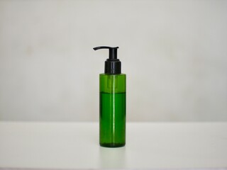 green skincare pump bottle with white background