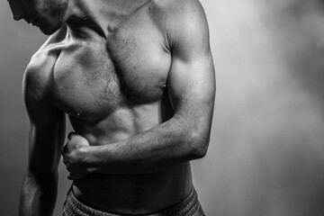 A young shirtless muscluar man