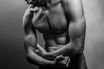 A young shirtless muscluar man
