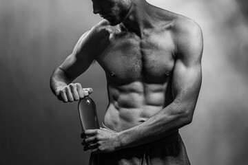 A young shirtless muscluar man