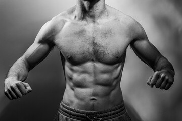 A young shirtless muscluar man