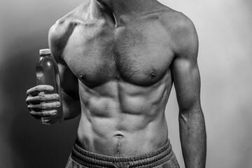 A young shirtless muscluar man