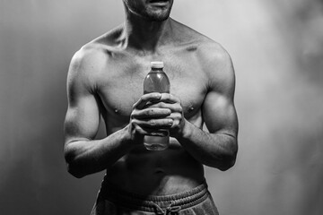 A young shirtless muscluar man
