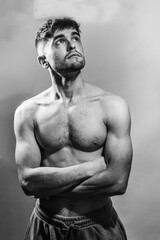 A young shirtless muscluar man