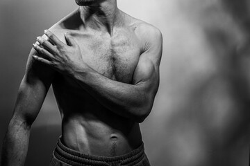 A young shirtless muscluar man