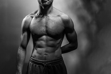 A young shirtless muscluar man
