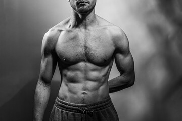 A young shirtless muscluar man