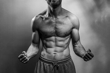 A young shirtless muscluar man