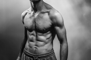 A young shirtless muscluar man