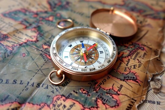 Vintage compass on antique map  a timeless symbol of adventure and exploration through history