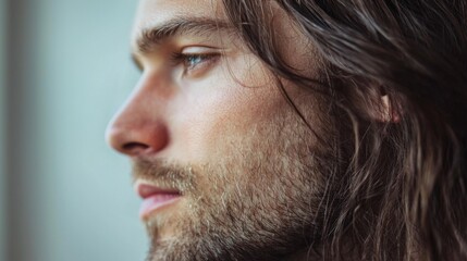 Obraz premium Young bearded long hair man close up portrait