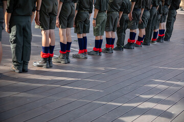 Young Cadets standing proudly in a disciplined line formation in their uniforms