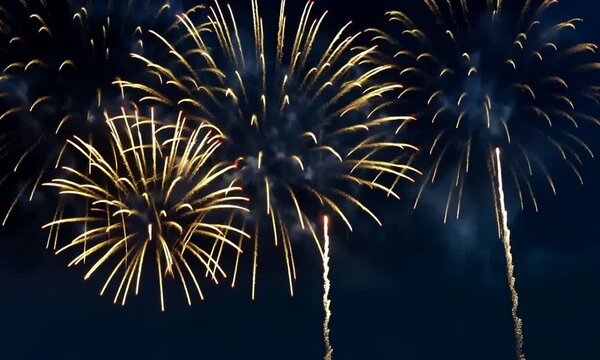 2025 New Year's Eve Party video. Colorful fireworks dark blue bokeh background video. Copy paste area for text