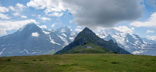 view to Eiger monch and Jungfrau mountain, Tschuggen in front side. famous peaks Bernese Oberland