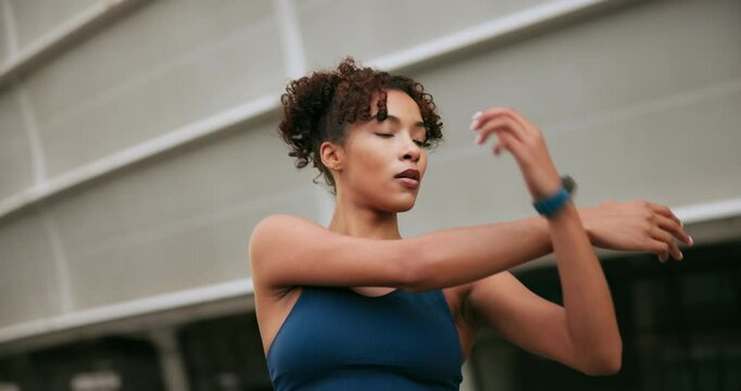 City, woman and training with arms for stretching, flexibility and prevention for muscle tension. Outdoor, female person and athlete with warm up for exercise, fitness or workout challenge for health