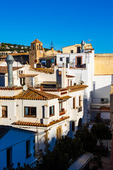 Bell tower of Sant Vincen&ccedil; Church in the center of Tossa de Mar seen from the old town&rsquo;s walls
