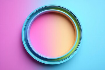 Obraz premium A circular container filled with vibrant, blended shades of pink, orange, and blue against a softly colored background.