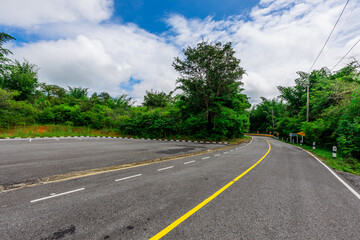 Panoramic nature background from a viewpoint on a high mountain overlooking the scenery below, river, road, rocks, trees, the beauty of nature during a trip in Khon Kaen, Thailand.