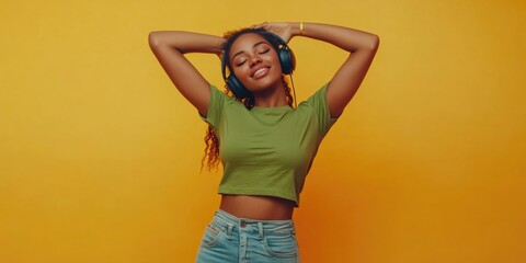 A young woman posing with confidence, wearing a green shirt and jeans