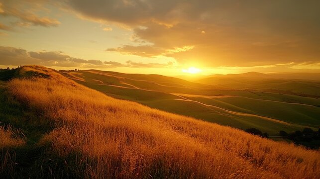 Golden sunset over rolling hills.
