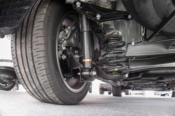 Obraz premium MPV car suspension and rear drive shaft.