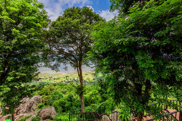 Panoramic nature background from a viewpoint on a high mountain overlooking the scenery below, river, road, rocks, trees, the beauty of nature during a trip in Khon Kaen, Thailand.