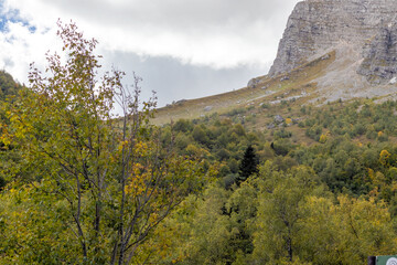 the beginning of the autumn period in the highlands-panoramic views of mountain ranges and alpine...