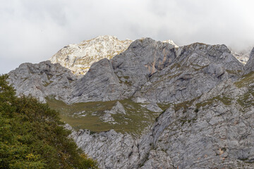 the beginning of the autumn period in the highlands-panoramic views of mountain ranges and alpine...