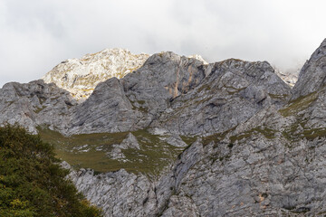 the beginning of the autumn period in the highlands-panoramic views of mountain ranges and alpine...