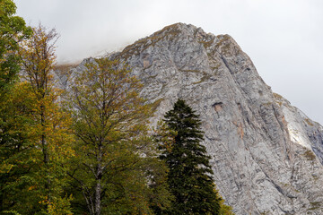 the beginning of the autumn period in the highlands-panoramic views of mountain ranges and alpine...
