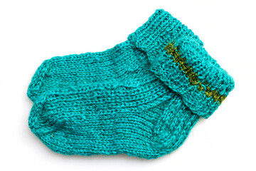 Warm, woolen knitted socks isolated on white background. Warm socks made of wool for winter season. 