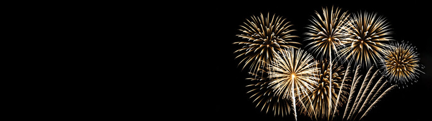 Naklejka premium Abstract Dotted New Year Fireworks in Gold on Dark Background