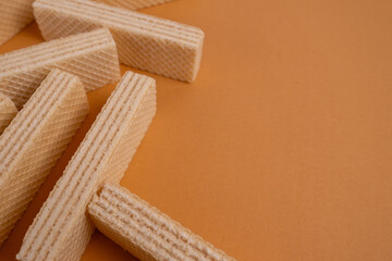 Waffles on a colored background. Sweet dessert. Nutrition concept. Tasty sweets