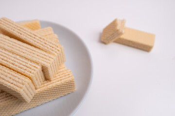 Waffles on a colored background. Sweet dessert. Nutrition concept. Tasty sweets