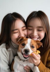 Two Asian women with a dog