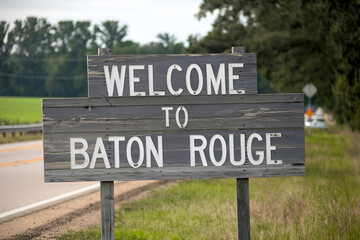 Stylish wooden "Welcome to Baton Rouge" sign, ideal for US city entrance road signs, travel signage, urban landmarks, and city-themed branding projects.