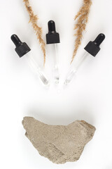 Pipettes with liquid on a white background