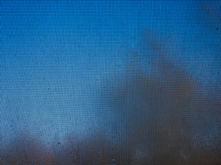 Window Screen and Wet Glass