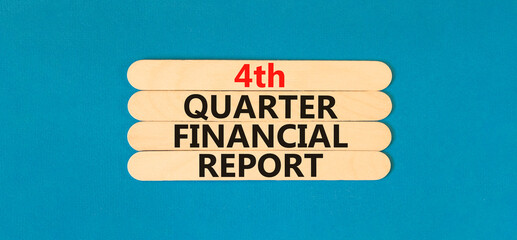 4th quarter financial report symbol. Concept words 4th quarter financial report on beautiful wooden...