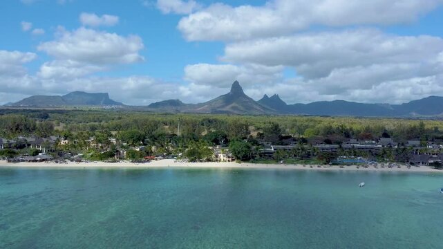 Aerial view of gorgeous Rempart mountain from Flic en Flac beautiful tropical beach, Mauritius island, Africa