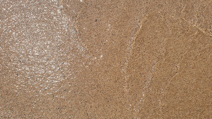 Beautiful sand and water in the summer day. Sand near a sea.