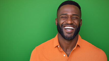Fototapeta premium Ultra Handsome Man Smiling and Laughing on Bright Green Background