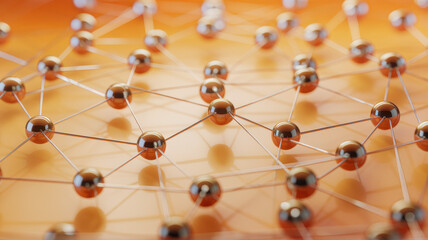 Close-up of a network of interconnected spheres representing molecular structures on an orange background.