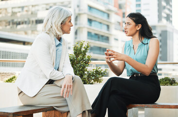 Business, women and meeting at office balcony for strategy, brainstorming and planning in France....