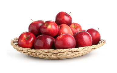Fresh ripe red apples in wicker bowl isolated on white