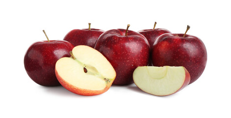 Whole and cut ripe red apples isolated on white